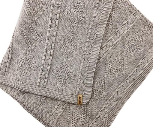 Beige wiegdeken merinowol gebreid kabel