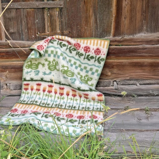 wiegdeken groen rood geel lamswol klippan esbjörn multi